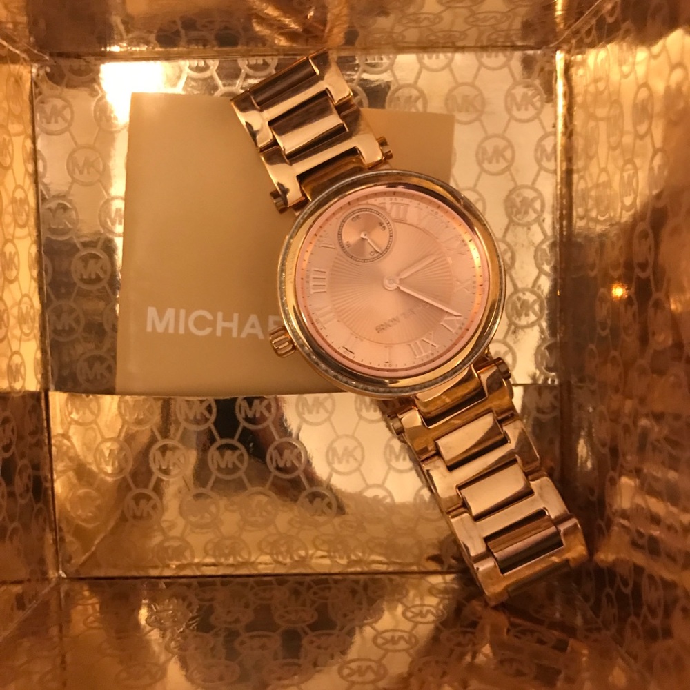Rose gold Michael Kors watch.